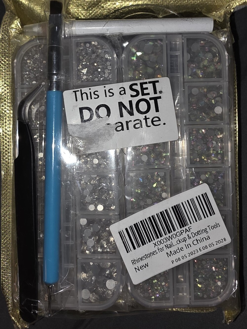 Nails, Rhinestones & Tools